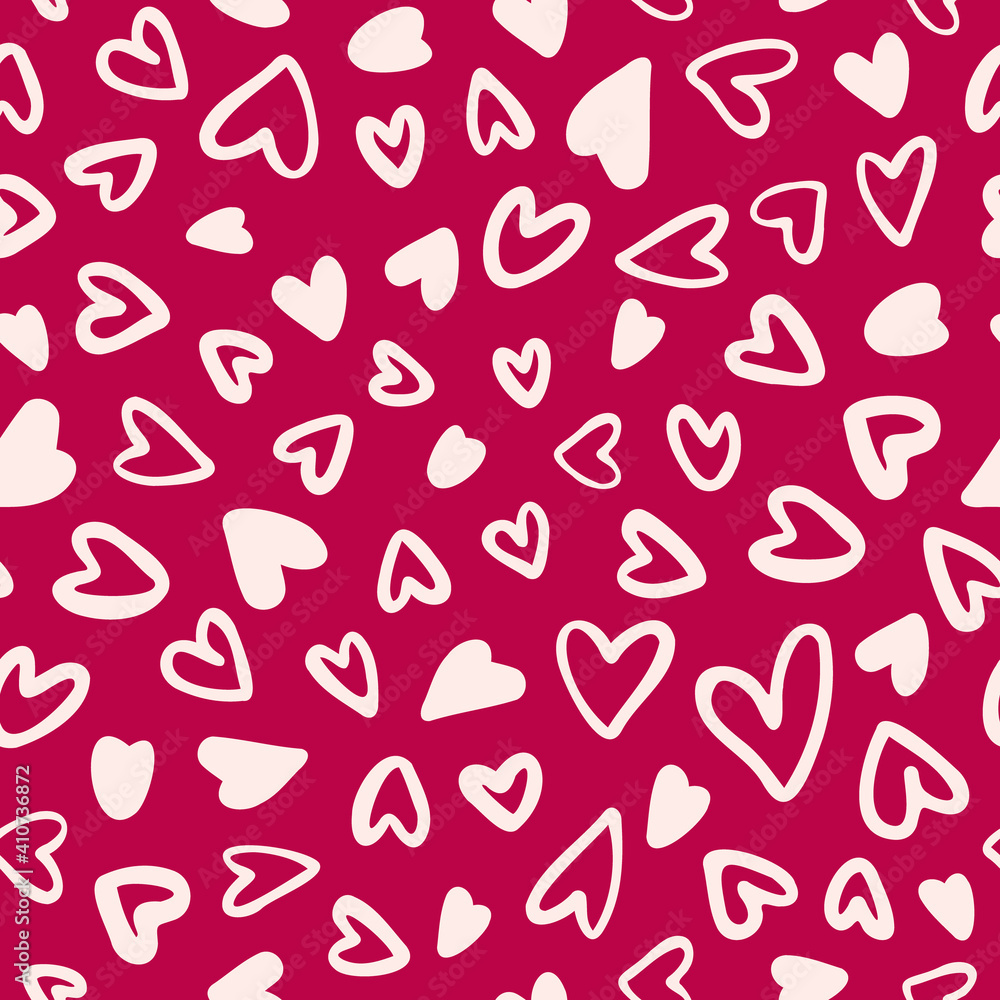 Random placed vector hearts seamless pattern with pink background.