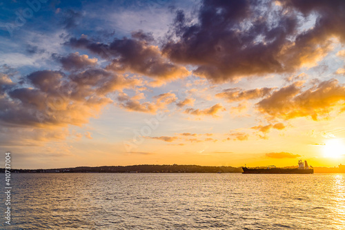 Beautiful waterfront, sky and clouds during sunset, view on Gravesend Bay in Brooklyn , New York
