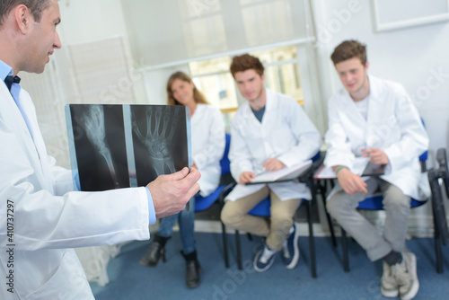 student and teacher in medical class - xray results