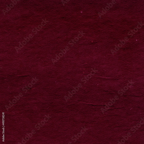 Cardboard red abstract pattern texture close-up. Retro old paper background. Grunge concrete wall. Vintage blank wallpaper.