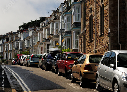 Cars Parking In Front Of Charming Row Houses At Bedford Road St Ives Cornwall England On A Sunny Summer Day With A Few Clouds In The Sky © Joerg