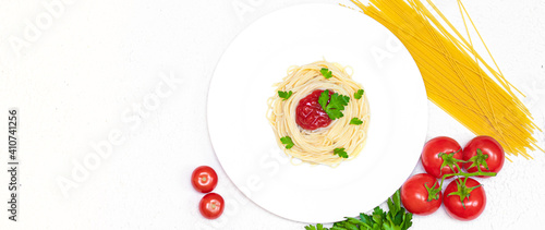 spaghetti on a plate with ketchup and herbs. pasta spaghetti with vegetables ketchup from vegetables Italian food healthy food. restaurant food concept. food for the menu. vegetarian