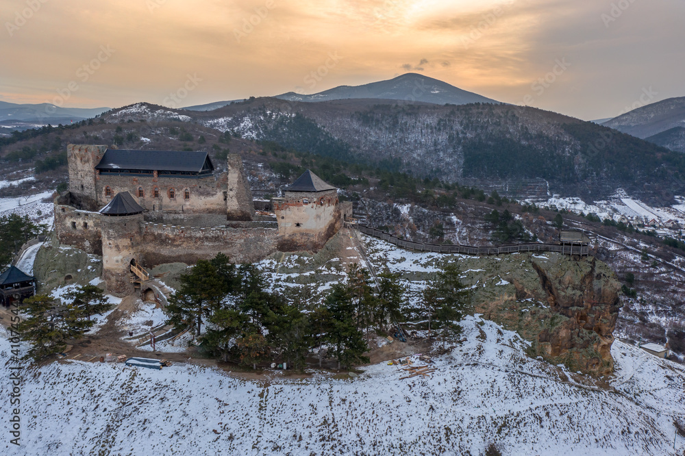 Hungary - Castle of Boldogko (Boldogkő) in Zemplen mountain. Hungarian historical castle in winter time with snow from drone view