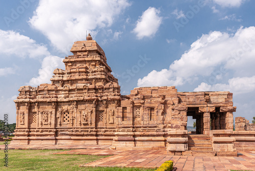 Bagalakote  Karnataka  India - November 7  2013  Pattadakal temple complex. Side closeup of Brown stone Sangameshwara Temple side closeup under blue cloudscape. 