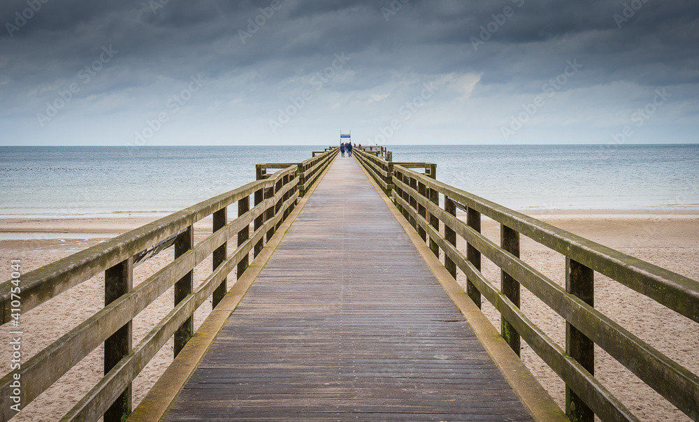 View of the pier in Boltenhagen, Germany, in a cloudy day