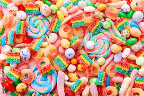 Mixed collection of colorful candy, close up. Flat lay, top view