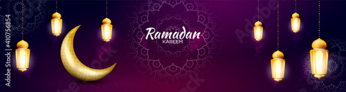 Elegant ramadan kareem banner design with golden moon and lantern