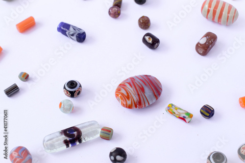 Bracelets and necklaces made of colorful beads photo