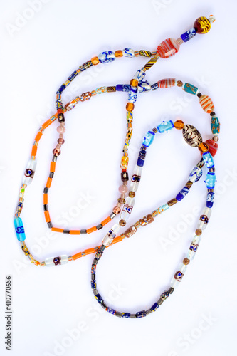 Bracelets and necklaces made of colorful beads photo