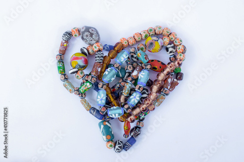 Bracelets and necklaces made of colorful beads photo