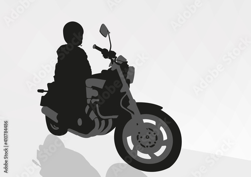 Cute girl drives a big motorcycle. Silhouette