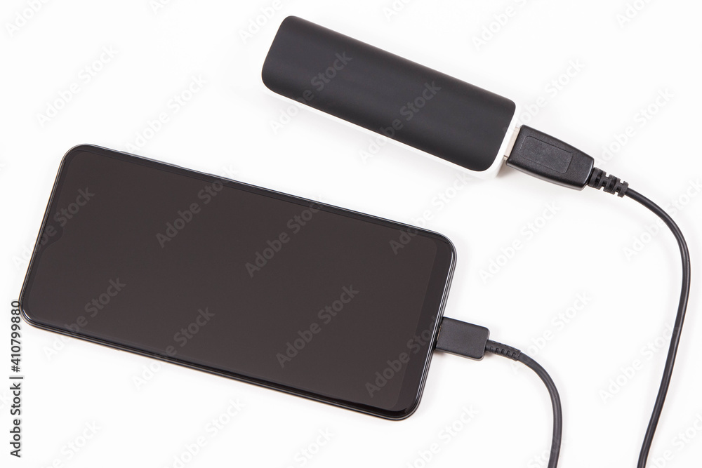 External powerbank charging empty battery of smartphone or mobile phone External powerbank charging empty battery of smartphone or mobile phone