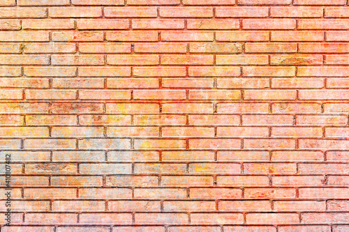 Painted brick wall texture. Colorful brickwork background. Multicolored masonry