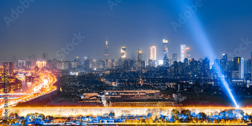 Night view of Ming Dynasty Great Wall and city skyline in Nanjing, Jiangsu, China 