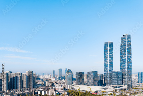 Sunny view of Kunming twin towers and city skyline in Yunnan, China  © Govan