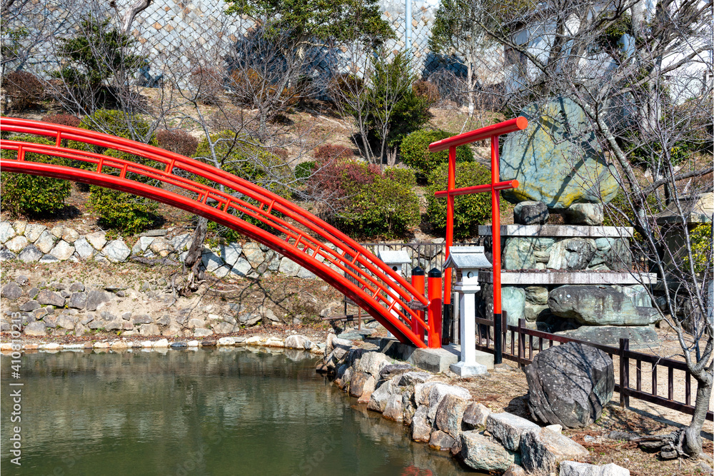 An arched bridge in the garden on Kannoji temple in Nishinomiya, Hyogo, Japan