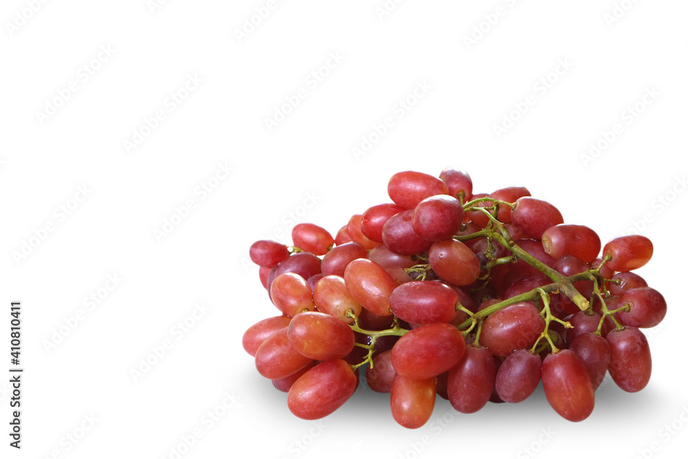 A large bunch of fresh red grapes isolated on the white background.