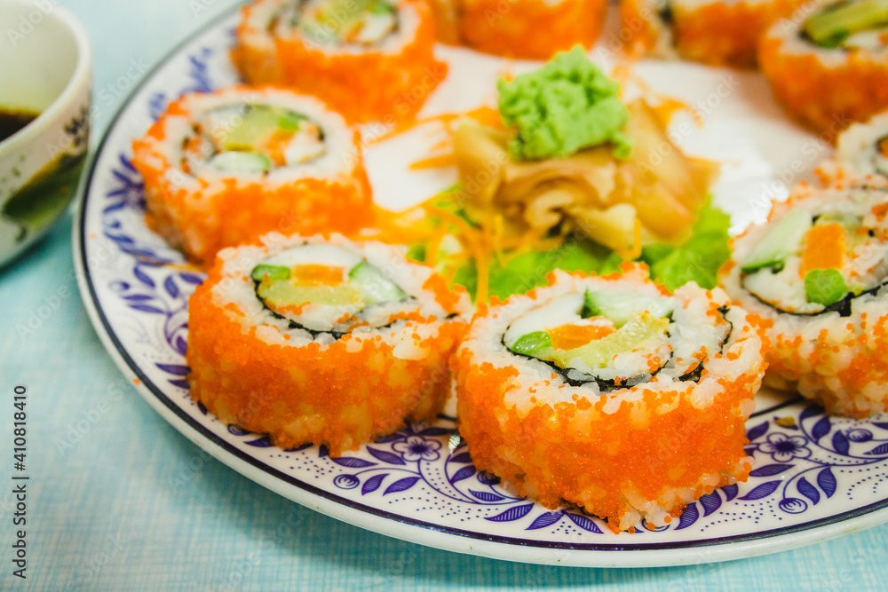 Selective focus point california roll maki sushi - japanese food style
