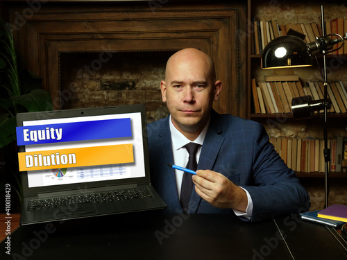 Φωτογραφία Financial concept meaning Equity Dilution with sign on laptop.