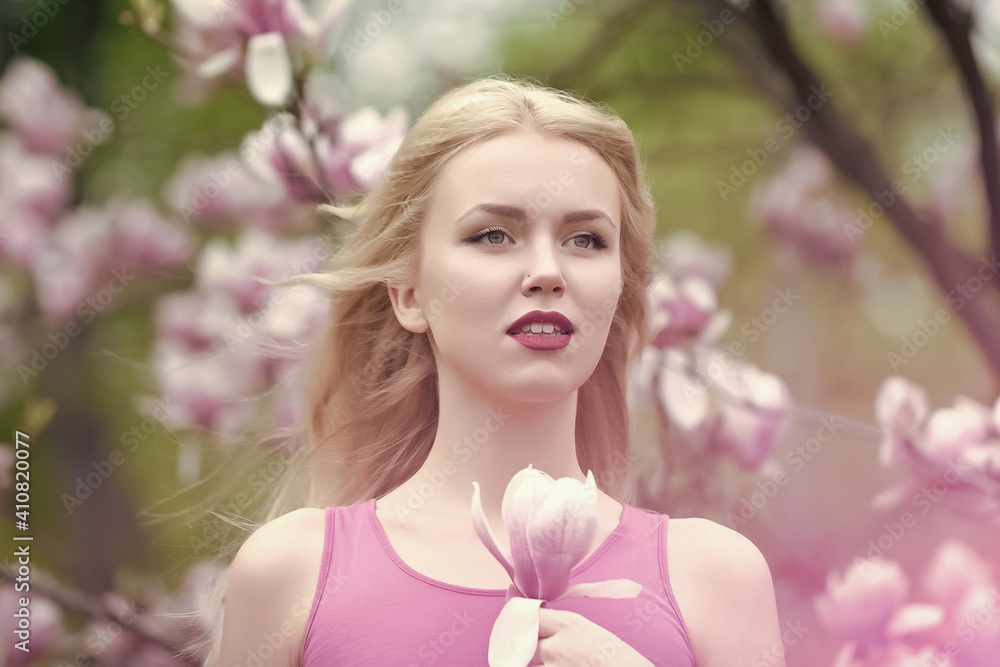 Spring, nature and environment. Magnolia flower blossom and woman in blossom park. Spring, nature and environment. Magnolia flower blossom and woman in blossom park.