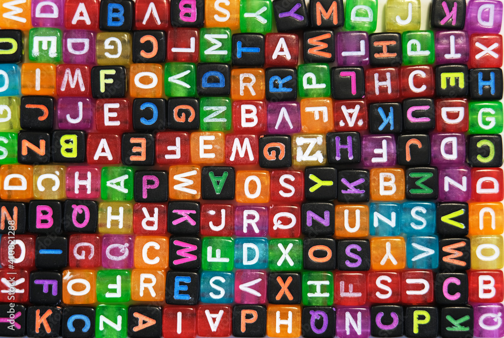 Fototapeta premium colorful cubes with letters, background