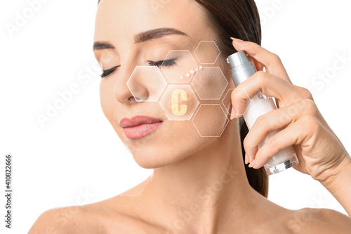 Woman applying cosmetic ser...
