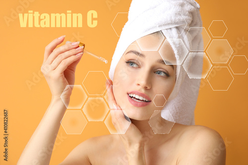 Woman applying cosmetic ser...