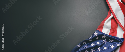 USA flag on dark background with space for text