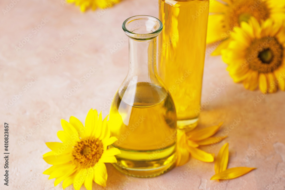 Bottle of sunflower oil on color background Bottle of sunflower oil on color background