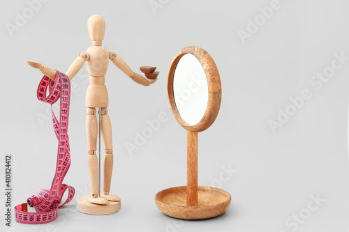 Wooden mannequin with measu...