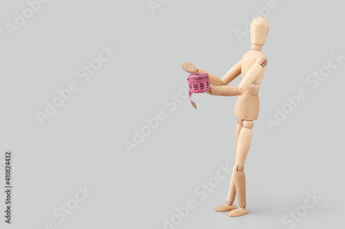 Wooden mannequin with measu...
