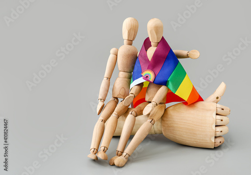 Wooden mannequins with rain...