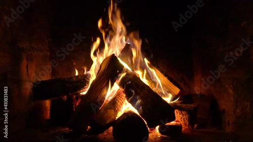 A fire burns in a fireplace, Fire to keep warm.