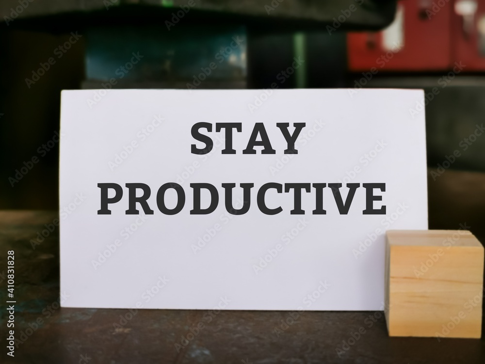 Selective focus with noise effect phrase STAY PRODUCTIVE written on white card. Business concept.