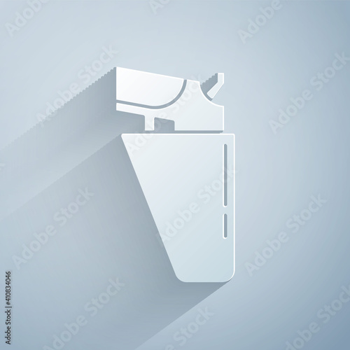 Paper cut Revolver gun in holster icon isolated on grey background. Paper art style. Vector.