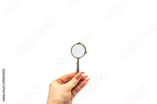 Tableau sur toile Hand hold an old vintage lorgnette from the middle of the nineteenth century on