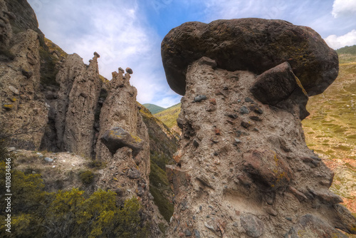 Sandy pillars. Stone mushrooms. Geological formations. © Sergei