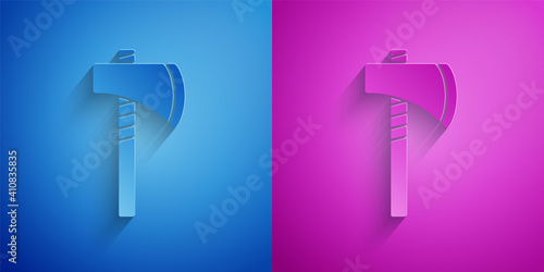 Paper cut Native american tomahawk axe icon isolated on blue and purple background. Paper art style. Vector.