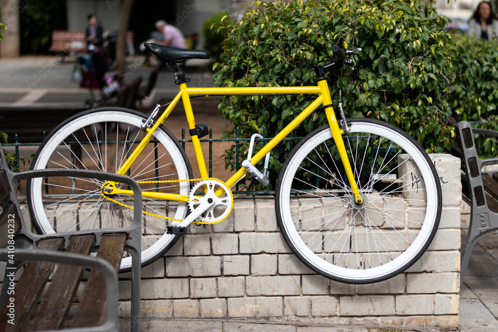 Yellow bicycle in the downtown of Tel Aviv