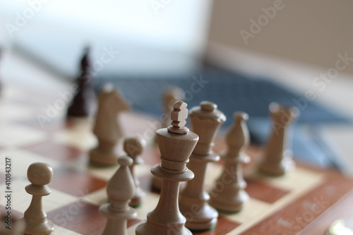 Online chess. Wooden pieces on a chessboards. Play Chess Online for all levels. From the cancellation of over the board chess by launching an online tournament. Internet chess. Business strategy.