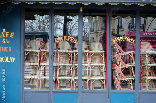 Some tables and chairs piled up in closed Parisian restaurants and cafes during coronavirus pandemic. 4th February 2021. © Yann Vernerie