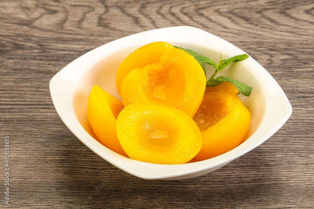 Sweet ripe canned peaches with mint Sweet ripe canned peaches with mint