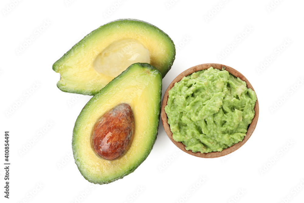 Bowl of guacamole and avocado isolated on white background Bowl of guacamole and avocado isolated on white background