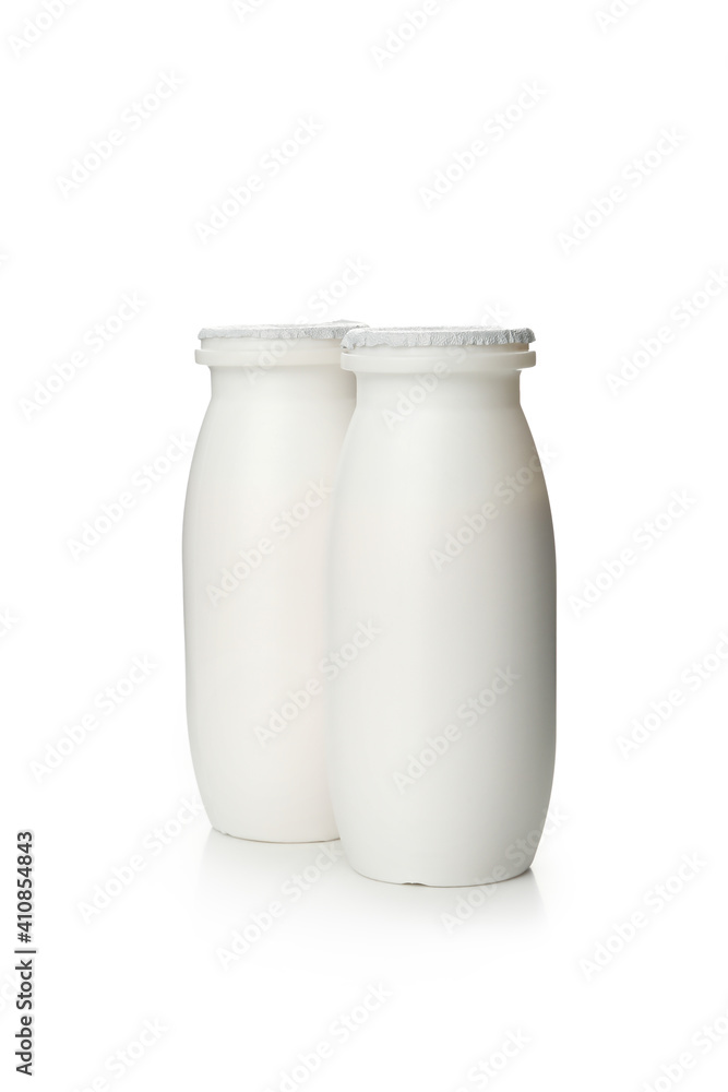 Blank bottles with yogurt isolated on white background Blank bottles with yogurt isolated on white background