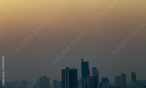 panoramic high-angle evening background of the city view,with natural beauty and blurred sunsets in the evening and the wind blowing all the time,showing the distribution of city center accommodation