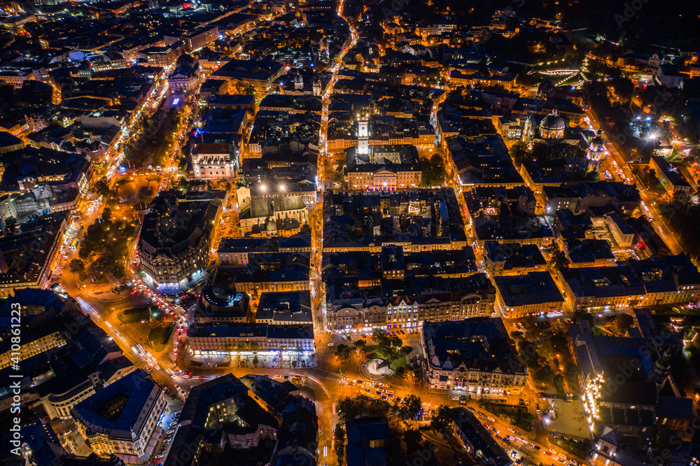 Aerial view on Lviv, Ukraine at night from drone - obrazy, fototapety, plakaty 