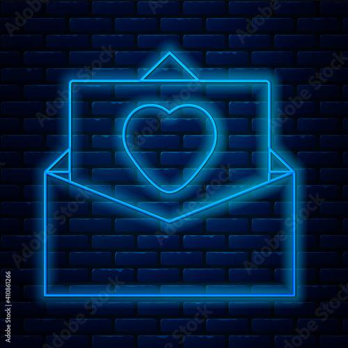 Glowing neon line Envelope with Valentine heart icon isolated on brick wall background. Message love. Letter love and romance. Vector.