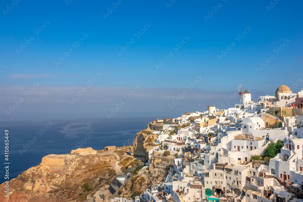 Windmills and White Houses on a Mountainside in Oia Town
