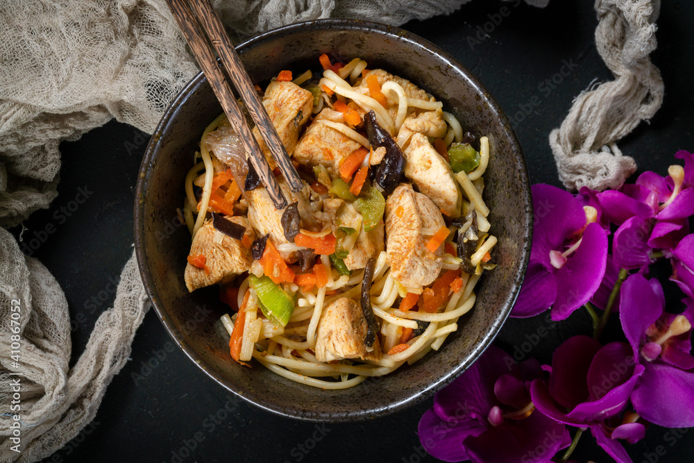 Fried noodles with chicken and vegetables. Fried noodles with chicken and vegetables.