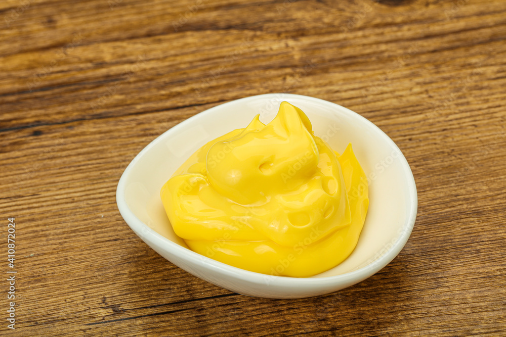 Natural cheese sauce in the bowl Natural cheese sauce in the bowl